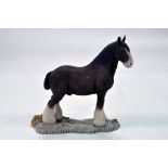 A static presentation piece comprising a Shire Horse. Fine Model with Box.