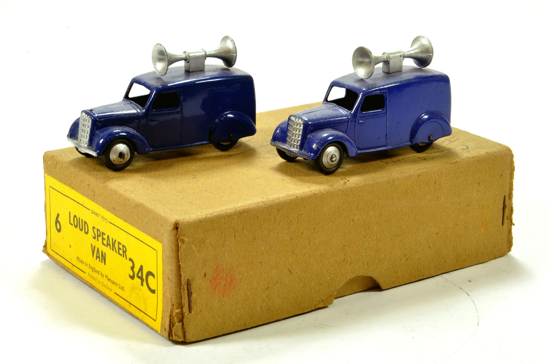 Dinky No. 34C Loud Speaker Van Trade Box with two E to NM models. Dividers present.