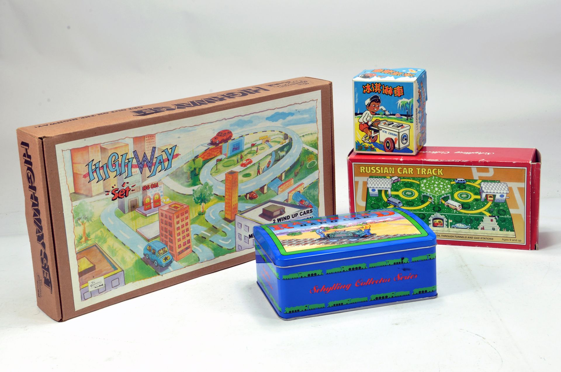Misc group of tin plate toys including Highway Set and others. Generally E in Boxes.