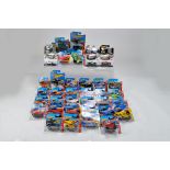 Large group of Hot Wheels Carded issues with some harder to find items. E to NM.