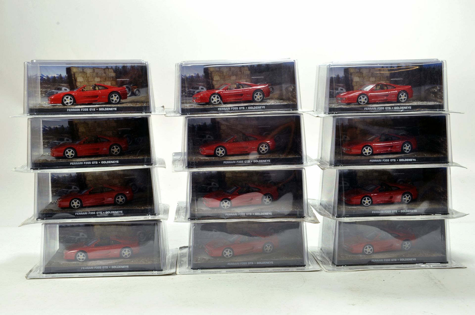 Large Assortment of Ferrari diecast models in 1/43. E to NM in Boxes. (12)