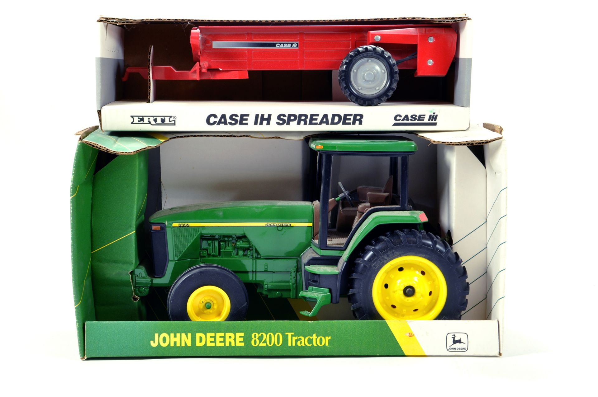 Ertl 1/16 Farm issues comprising John Deere 8200 and one other. Generally E to NM. (2)