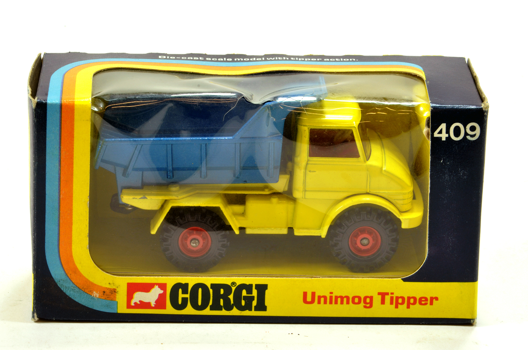 Corgi No. 409 Unimog Tipper in Blue and Yellow. E to NM in VG Box.