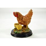 A static presentation piece comprising a Chicken and Chicks. Fine Model with Box.