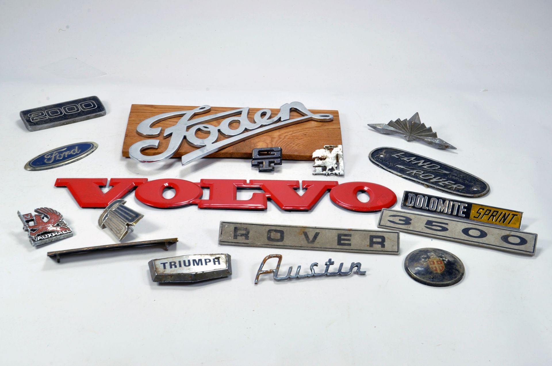 A selection of various original Truck / Lorry / Car Badges and Emblems. Volvo, Rover, Foden, Land