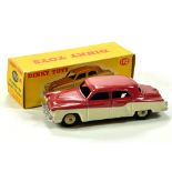 Dinky No. 172 Studebaker Land Cruiser in two-tone cerise, cream with beige ridged hubs. Fine example