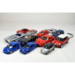 Large assortment of mainly 1/18 diecast cars from Burago, Maisto Etc. Generally F.