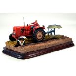 A static presentation piece comprising Reversible Ploughing, A Border Fine Arts model featuring a