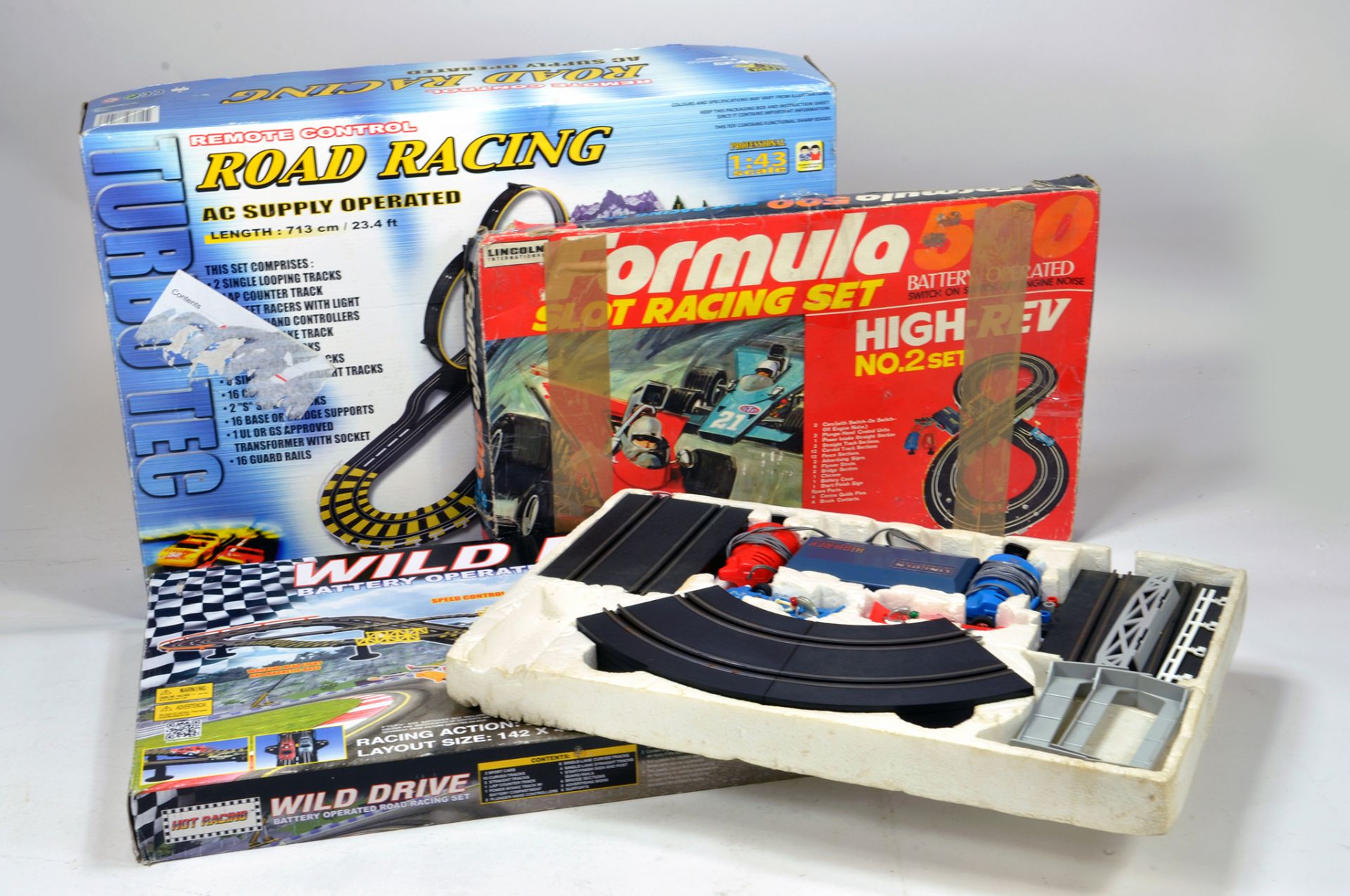 Trio of slot car racing sets. Untested but appear complete.