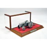A bespoke and finely presented model in glass display cabinet of a Ferguson TE20 Tractor and Plough.