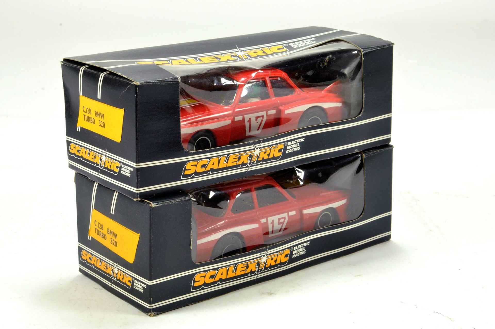 Vintage Scalextric Duo comprising C.128 BMW 320 Turbo. Untested but display well in original