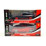 Xstreet RC 1/18 issues comprising Porsche 911 and Ferrari 458 Italia.