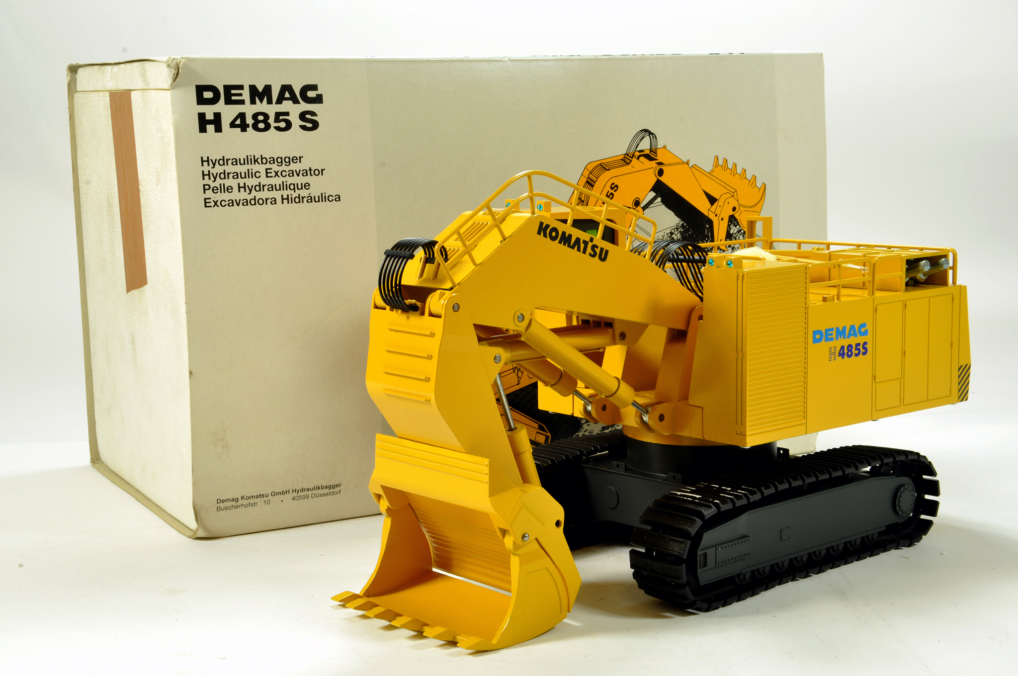 NZG 1/50 construction issue comprising No. 357 Komatsu DEMAG 485S Hydraulic Excavator. Generally E