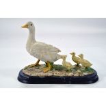 A static presentation piece comprising a Duck and Ducklings. Fine Model with Box.