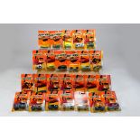 A group of As New and Carded Matchbox diecast issues.