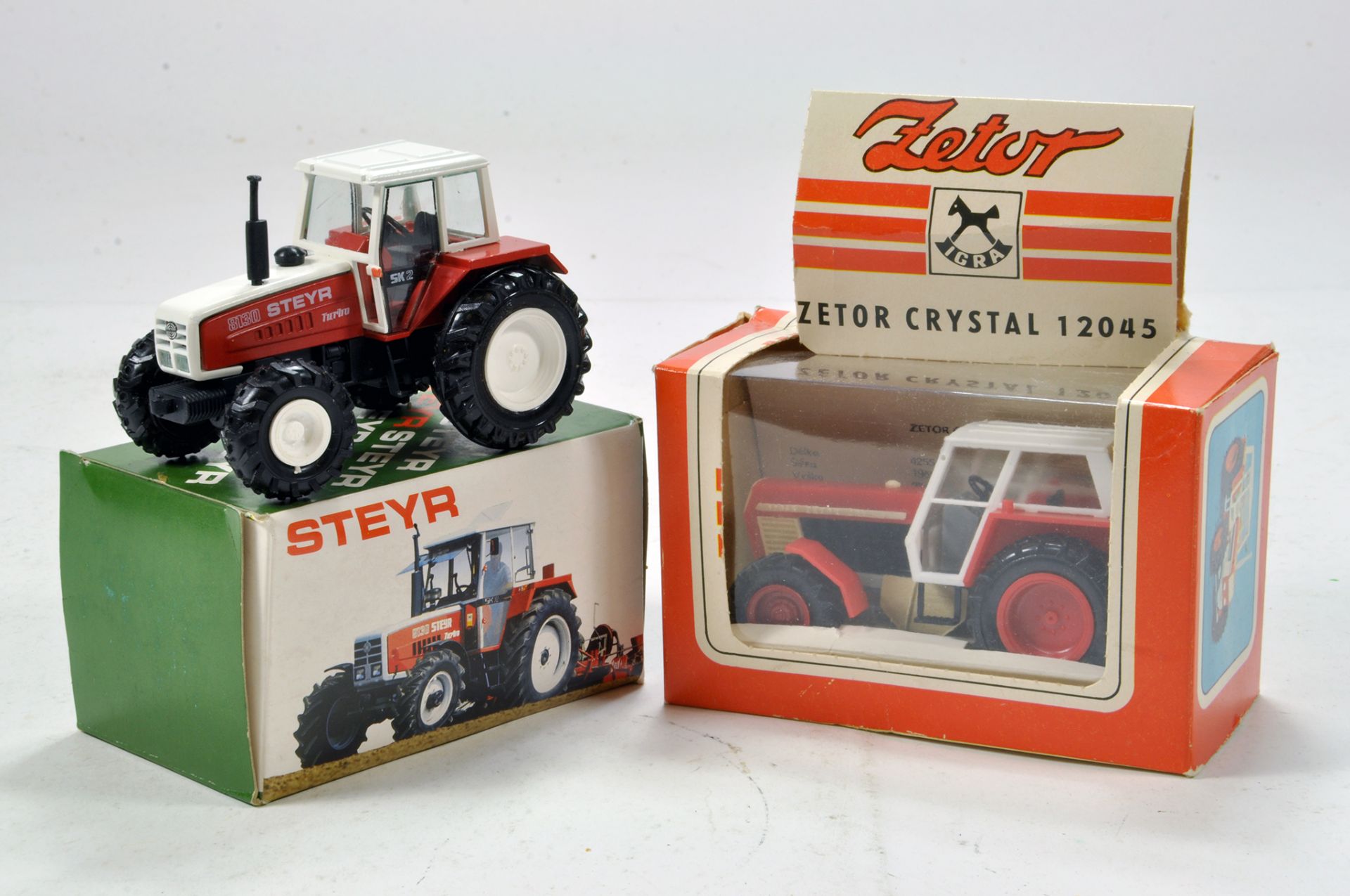 Conrad 1/50 Steyr Tractor plus Plastic issue Zetor Crystal. Generally E to NM in Boxes.