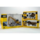 Norscot diecast construction group comprising various issues. CAT Material Handler, Skid Steer and