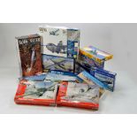 A group of plastic model kits from Revell, Airfix, Italeri and others. Complete.
