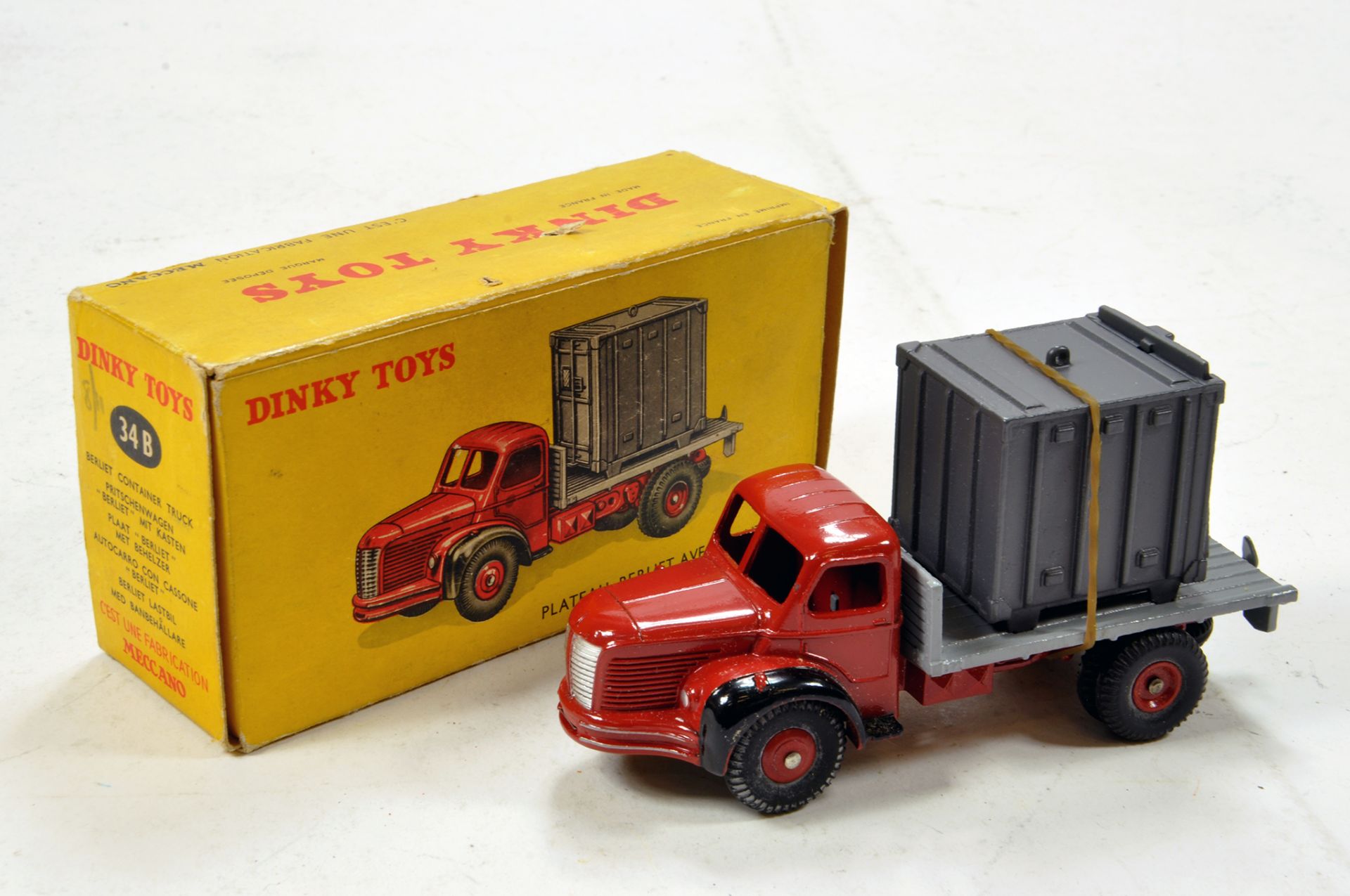 French Dinky No. 34B Berliet Container Truck with red cab and chassis, grey back and load. Good