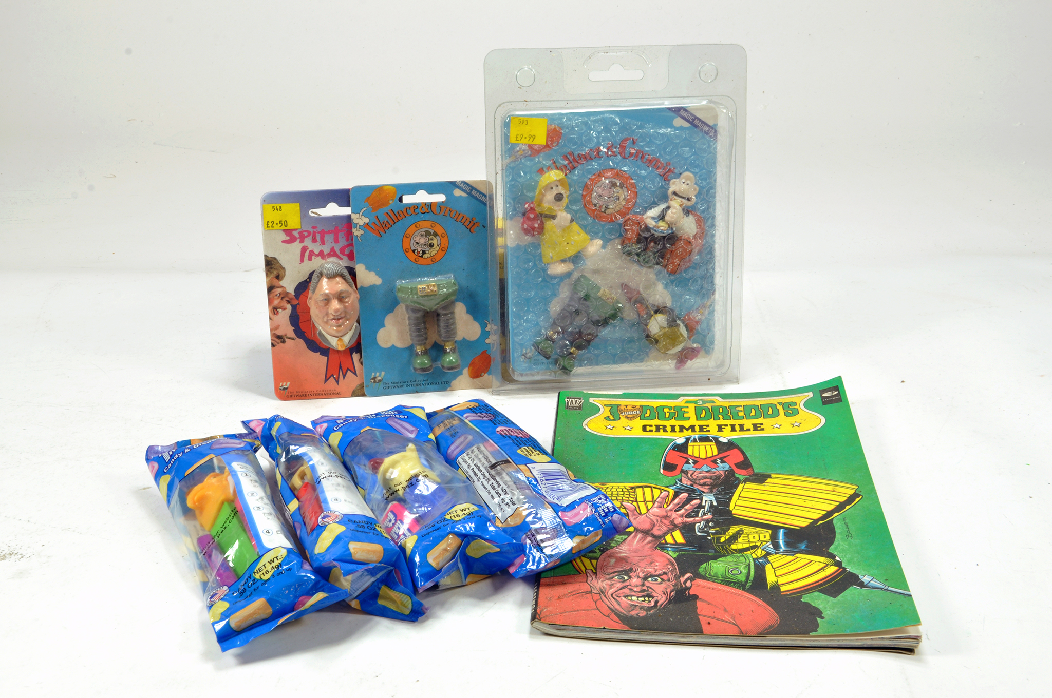 Novelty Toy group including Wallace and Gromit, Judge Dredd Comic and other items.