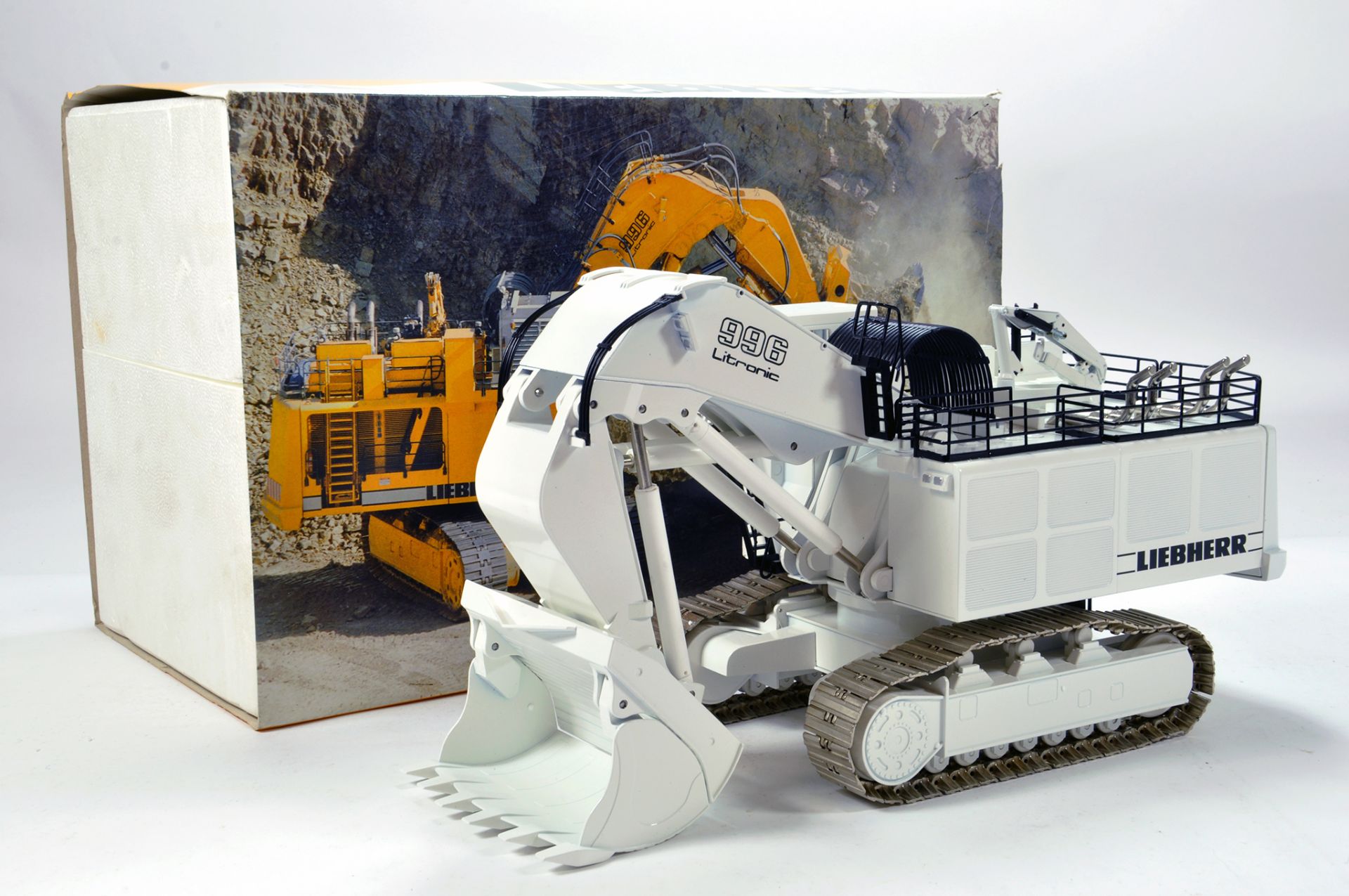 Conrad 1/50 construction issue comprising Liebherr 996 Hydraulic Shovel Excavator White Edition. E