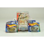 A trio of carded diecast from Hot Wheels and Matchbox including harder to find Hanna Barbera