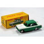 Dinky No. 189 Triumph Herald in two-tone green and white with silver trim and chrome spun hubs. Fine