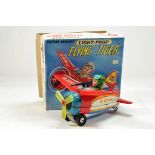 An unusual and large Japanese Modern Toys Japan battery operated Flying Tiger Tin Plate Aircraft