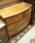 A 19th Century mahogany bow fronted chest of two short over two long drawers on splayed bracket