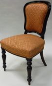 A set of six Victorian mahogany framed dining chairs with upholstered back panels and seats on