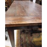 A modern teak farmhouse style kitchen table in the 19th Century French manner,