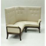 A mahogany framed high back corner sofa in the manner of Louis Majorelle,