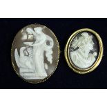 A Victorian gold mounted oval cameo brooch as Zeus seducing Hebe as an eagle together with another
