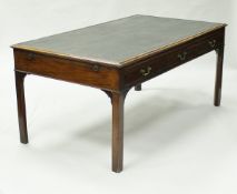 A George III mahogany library table in the Chippendale manner,