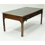 A George III mahogany library table in the Chippendale manner,