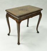 An 18th Century walnut side table,