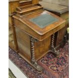 A Victorian walnut and inlaid Davenport desk of typical form with barley-twist front supports