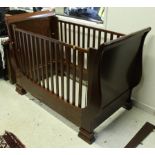 A Simon Horn cherrywood baby cot in the French sleigh bed style CONDITION REPORTS