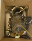 A box containing a brass pestle and mortar, pair of brass candlesticks,