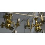 A brass three branch electrolier in the Dutch taste,