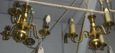 A brass three branch electrolier in the Dutch taste,