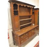 A 19th Century North Country oak and inlaid dresser,