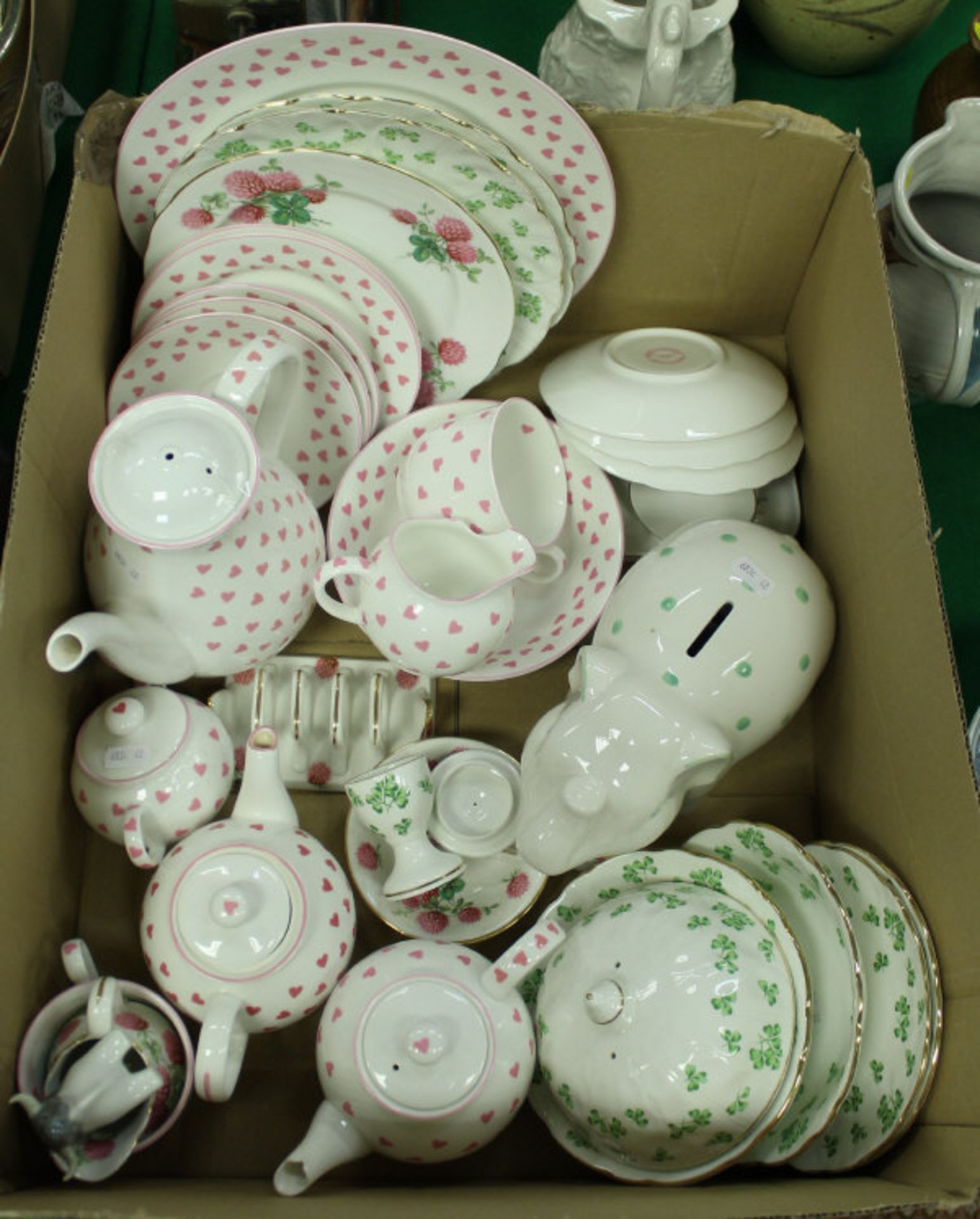 A box containing various chinawares including Nina Campbell loveheart decorated tea wares,