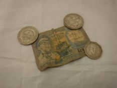 A box containing assorted Coins of the Realm, various bank notes,