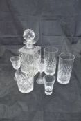 A suite of lead crystal "Somerset" pattern glasses including five decanters, beer glasses,