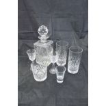 A suite of lead crystal "Somerset" pattern glasses including five decanters, beer glasses,