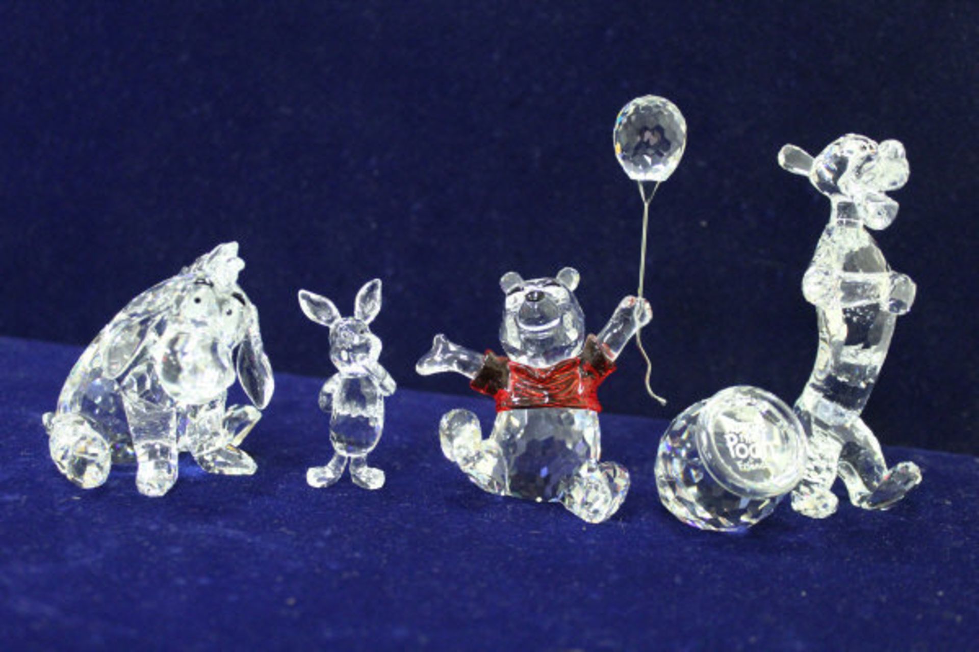 A Swarovski Winnie-the-Pooh collection including Winnie-the-Pooh, Tigger,