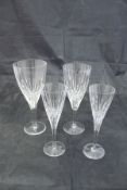 A modern part table service of Atlantis glass comprising thirty wine glasses,