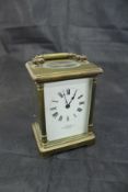 A circa 1900 French lacquered brass cased carriage clock,