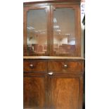 A 19th Century mahogany bookcase cabinet with two glazed doors over two drawers and two cupboard